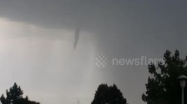Tornado forms over Denver, US