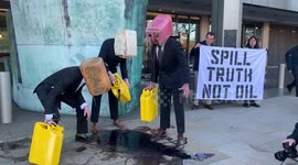 Climate activists 'vomit' oil outside International Maritime Organization headquarters
