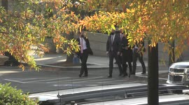 President of the United States Joe Biden walks from the Eisenhower Executive Office Building to the White House after delivering remarks in the South Court Auditorium in Washington, DC on November 22, 2021