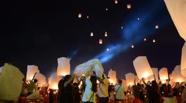 Chiang Mai night sky swarmed with breathtaking kindled lantern lights during the Yee Peng Lantern Festival