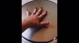 Woman shares hacks to spruce up your home for less including 'marble' table made from PIZZA PAN