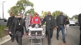 Armed New Black Panthers members gather outside court as they await Ahmaud Arbery verdict