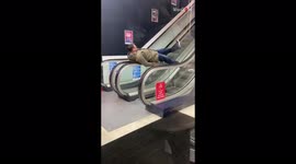 UK dad gets in on the 'Escalator Spin' craze with comical results
