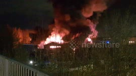 Smoke towers over neighbouring road during plastics factory blaze in Hessle, UK