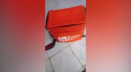 Abandoned baby girl found alive inside shopping delivery bag in Indonesia