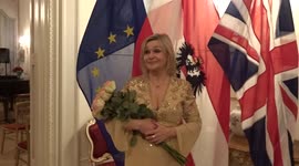 Soprano Birgit Beer posing for photographs after her concert at the Austrian Embassy in London