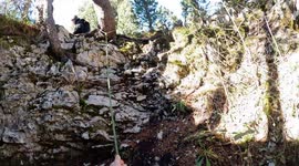 Claustrophobic footage shows group of thrill-seeking men abseiling down crystal ice cave