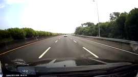 Loose wheel bounces into oncoming traffic on highway in Taiwan
