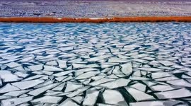 Hundreds of cracks on frozen lake form icy jigsaw in China