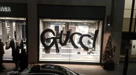 Gucci grafitti in window confuses shoppers in London