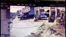 Archway collapses in eastern China, crushing scooter rider with debris