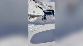 Roads get cleared following heavy snowfall in northern India