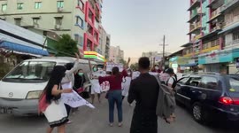 Protesters march after military truck rams crowd killing five in Myanmar