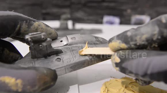 YouTuber films intricate process as they restore rusted toy helicopter