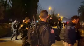 Israeli right-wing demonstrators gather following a stabbing attack earlier in the day