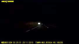 Man standing in the middle of the motorway at 3am