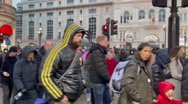 People NOT wearing masks despite a tightening of COVID measures imposed by the government in response to novel variant Omicron