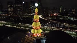 Stunning drone footage of giant Christmas tree lights looming over Sao Paulo highways