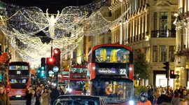 Crowds of Christmas shoppers in London's Oxford Street as UK COVID alert level is raised to 4