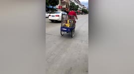 Iron cage installed on tricycle to ensue child’s safety in China