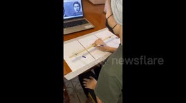 Drawing three different portraits with three pencils at the same time