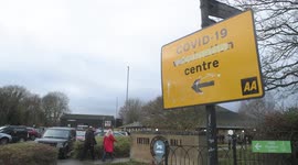 Footage shows queues outside a vaccination centre as bookings for booster open to over 30s