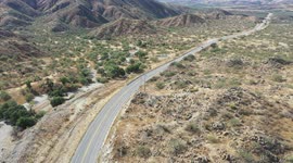 Aerial view of the landscape of the Sonoran desert in the horizer, sierra and highway in the municipality of Imuris, Mexico. drought, lack of water in the region