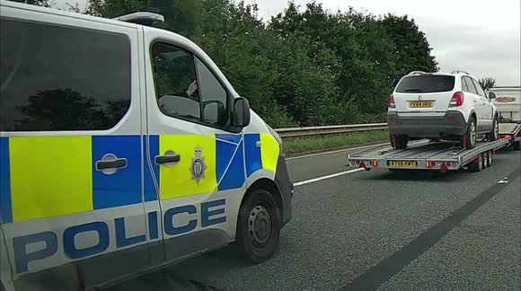 Police Officer driving whilst Texting , challenged by a driver asking them to stop.