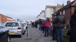 Footage shows queues outside a vaccination centre as bookings for booster open to over 18s