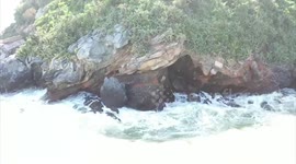 Kite surfers rescued after getting stuck on cliffs during rough seas in southern Thailand