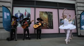 Ballerinas perform on Regent Street while Mexican Mariachi band plays 'Tequilla'