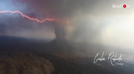 Drone footage captures moment lightning illuminates ash cloud from erupting La Palma volcano