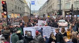 Protesters chant 'Freedom, freedom' at Oxford Circus