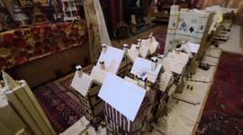 UK couple build 21-foot-long replica of London Bridge in their living room