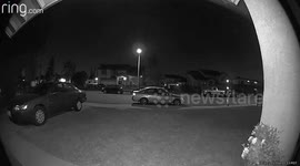 Ring app records some ghostly apparitions floating by this vehicle in the driveway at 4 in the morning