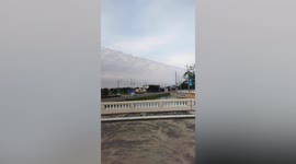 Big beautiful cloud stretches over homes in Thailand
