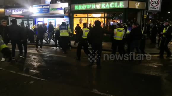 'Get back!' police yell as West Ham and Spurs fans face off ahead of Cup tie