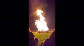 Video featuring fire centrepiece with additional fireworks display behind