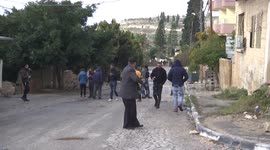 Palestinian demonstrators clash with Israeli forces following a protest against Jewish settlements