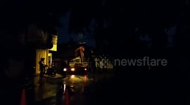 Rains and winds knocked down trees and cut off electricity in Tangerang, Indonesia