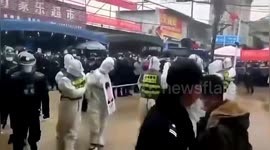 Chinese men publicly shamed for allegedly smuggling migrant to China who later tested positive for COVID-19