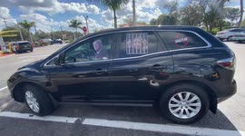 TRUMP supporter wants people to know what he thinks of Hillary Clinton as he's driving down the street!