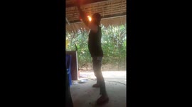 Vietnamese man used his mouth to put out the  burning torch