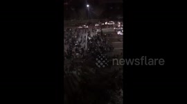 Hundreds of protesters charge security forces in Kazakhstan city as fuel price unrest continues