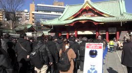 Thousands of Japanese workers pray for prosperity in 2022 at famous shrine