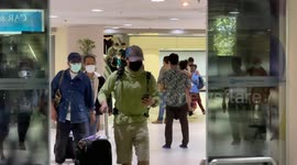 Bangkok airport pictured today as Thailand tightens travel rules amid Omicron surge