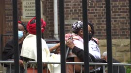 Family of Archbishop Desmond Tutu mourn outside St George's Cathedral