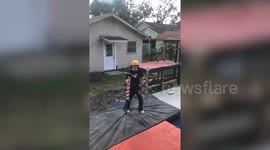 US man performs incredible pogo stunts including front flip down flight of 17 STAIRS