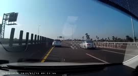 BRUTAL ACCIDENT: Abandoned package causes vehicle to lose control (Dashcam Video)