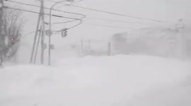 Snow piles up as blizzard batters northern Japan during country's cold  weather spell